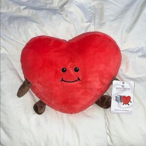 Heart-Shaped Red Plush Warmie. Warm the heart in the microwave for a comfort.
